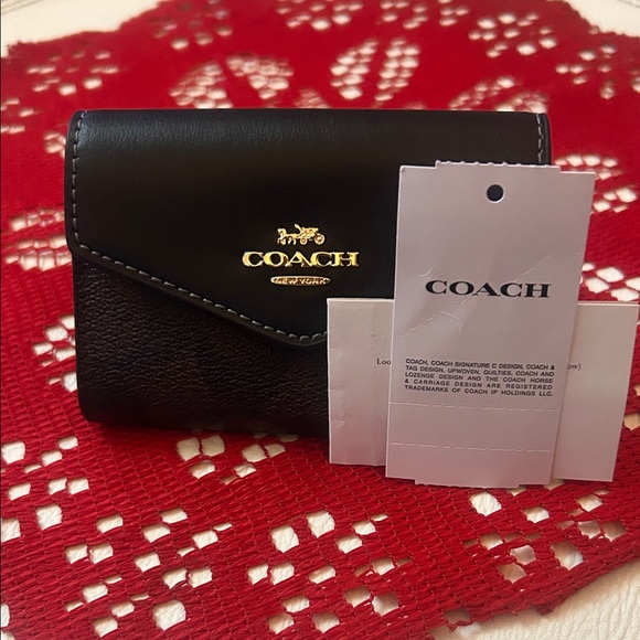 Coach Handbags - Coach Black Leather Women's Card Holder with Gold Accents